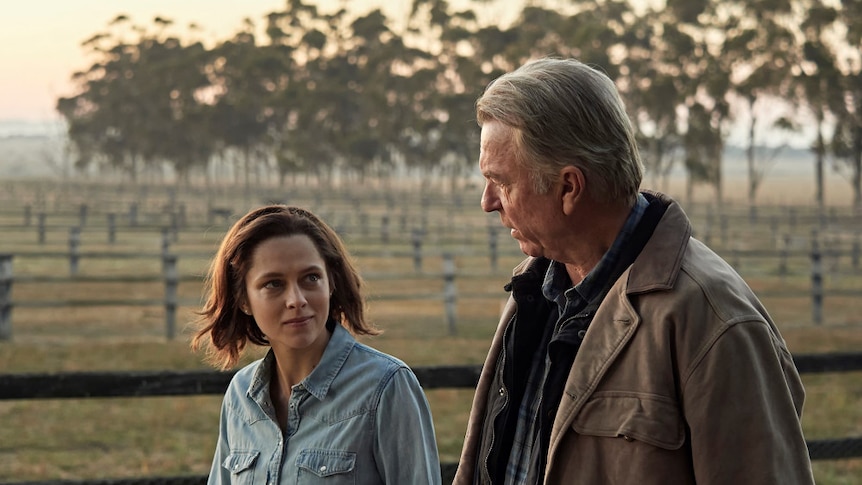 Teresa Palmer as Michelle Payne speaks with Sam Neill as her father in a still from Ride Like A Girl.