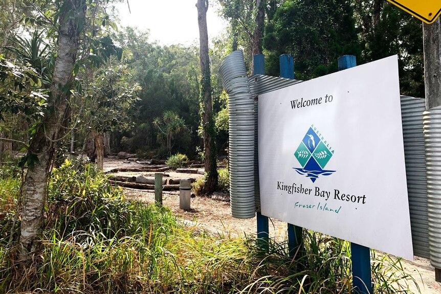 Welcome sign in bushland near jetty at Kingfisher Bay Resort on Fraser Island off south-east Queensland.