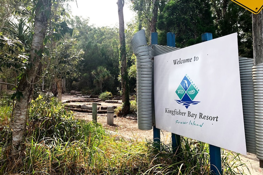 Welcome sign in bushland near jetty at Kingfisher Bay Resort on Fraser Island off south-east Queensland.