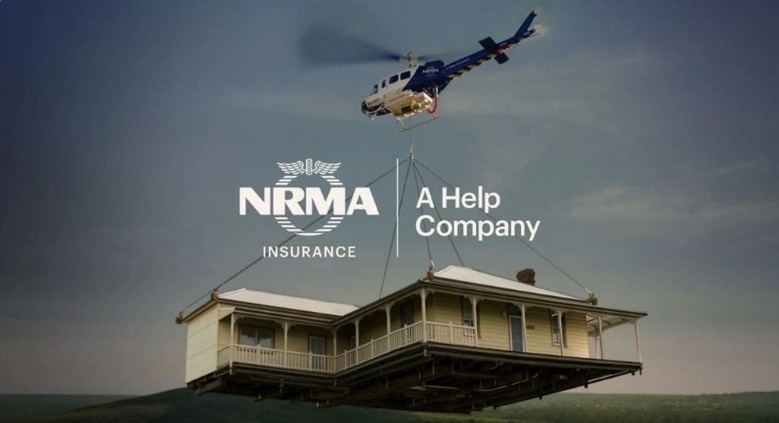 a helicopter lifts a house in an ad for insurer nrma