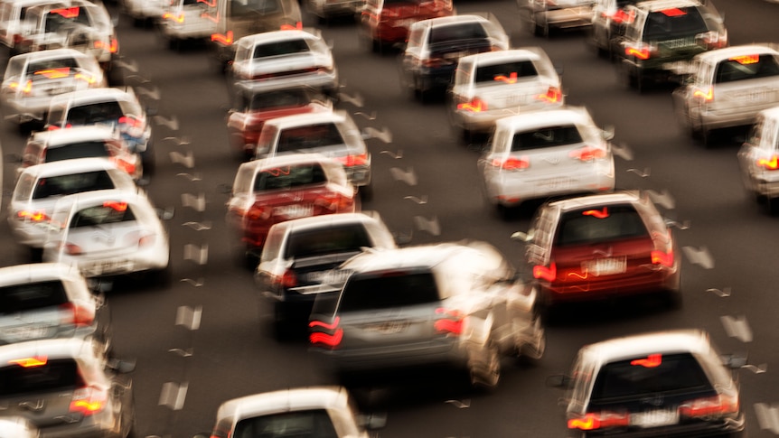 A long and hazy traffic jam of cars 