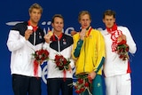 Matt Grevers, Aaron Peirsol, Hayden Stoeckel and Arkady Vyatchanin with their medals
