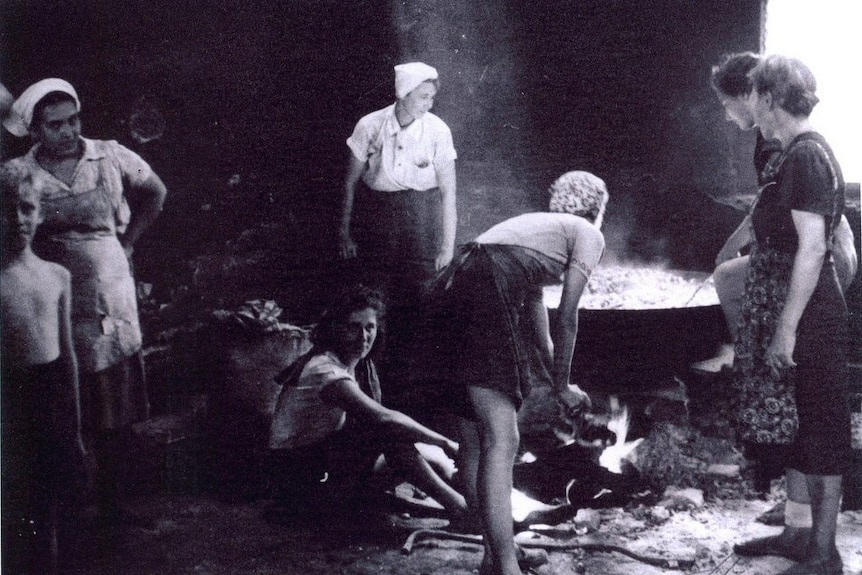 Women cooking in the Lampersari concentration camp in Indonesia during WWII.