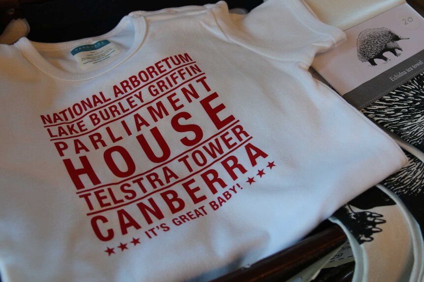 A cute baby onesie that says 'Canberra: It's great baby!'