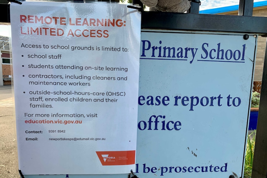 A sign on a primary school gate that outlines limited access to the school.