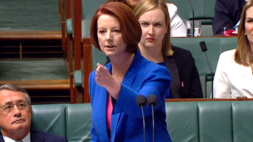 The Prime Minister Julia Gillard gestures as she speaks in Parliament during Question Time.