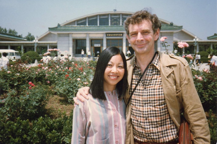 A man and a woman standing in the front of a museum in China's western city Xi'an.