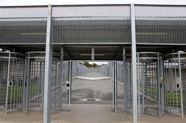 Metal and glass entrance to the Yongah Hill detention centre in WA