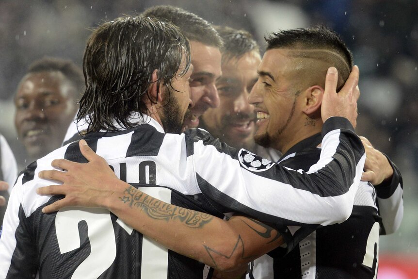 Italians progress ... Fabio Quagliarella (C) celebrates scoring Juventus's second goal against Celtic.