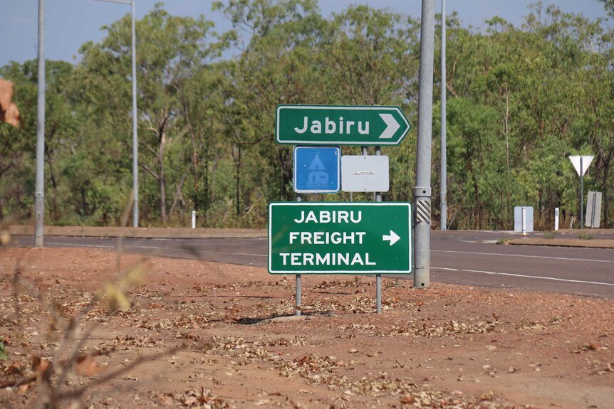Two road signs saying "Jabiru" and "Jabiru Freight Terminal"