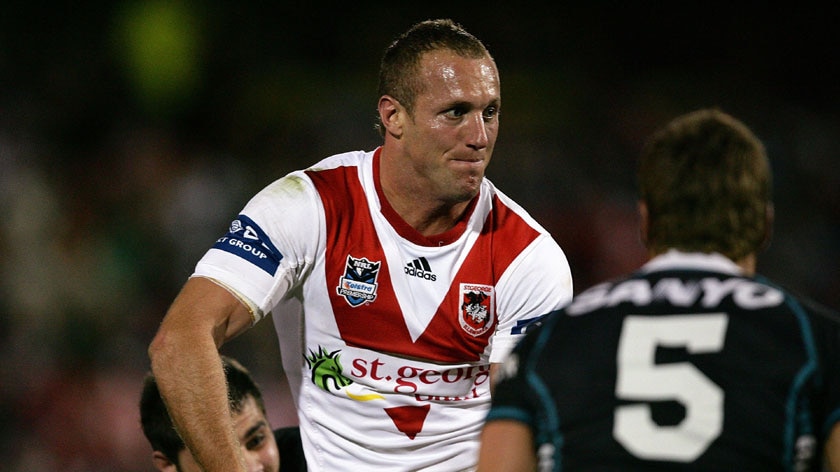 Looking to offload ... Mark Gasnier looks for his support against the Panthers
