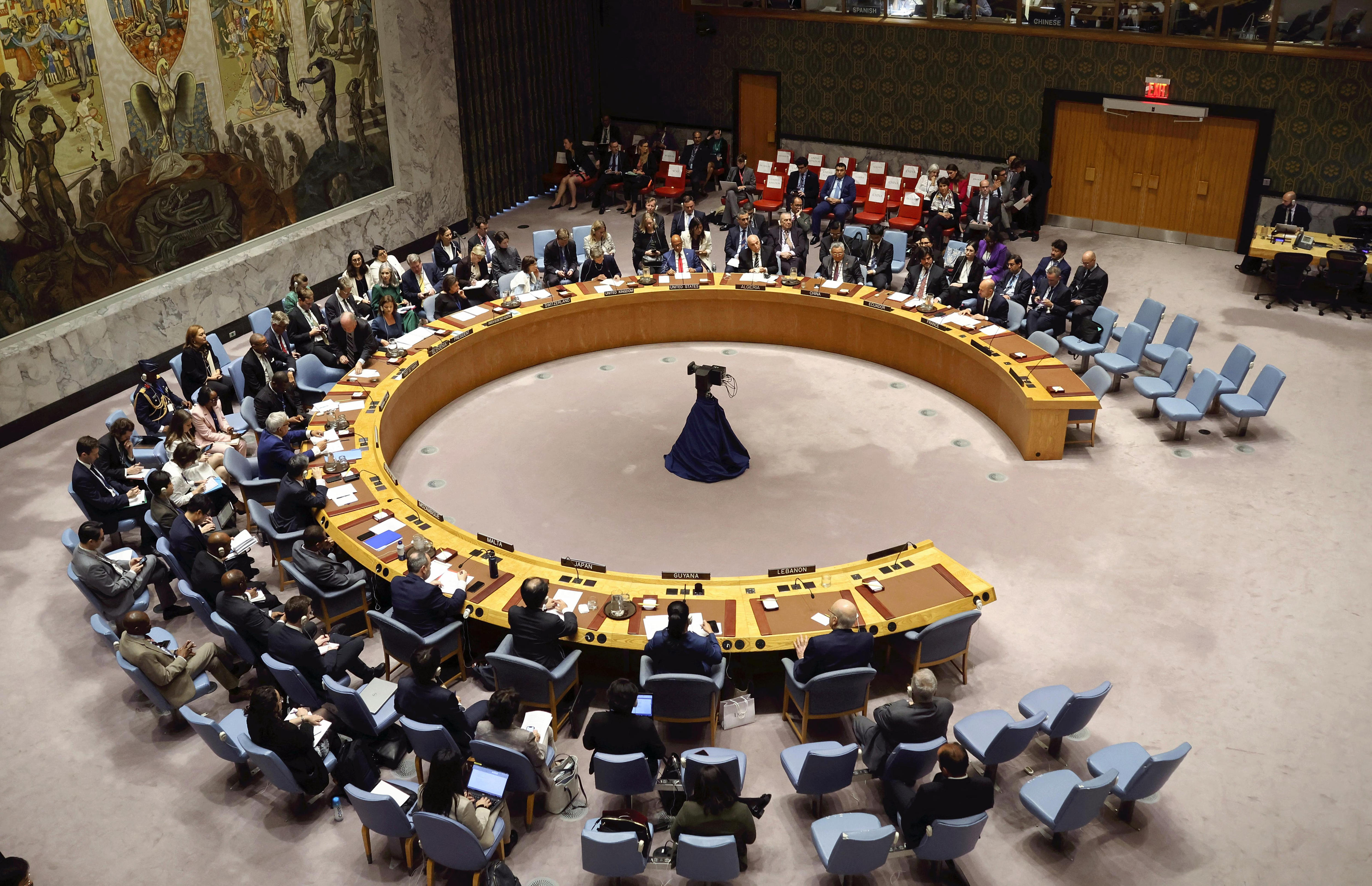 Three rows of chairs arranged in a circle.