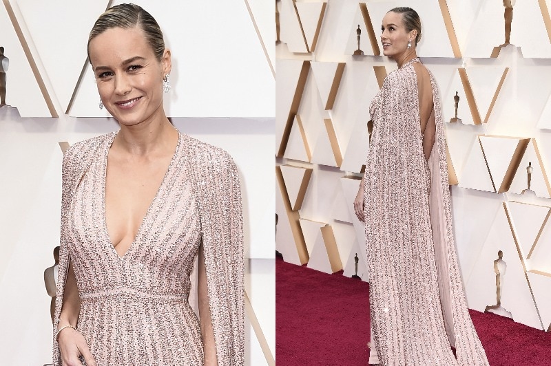 Brie Larson wearing a pale pink dress with a train and bejewelled detailing.