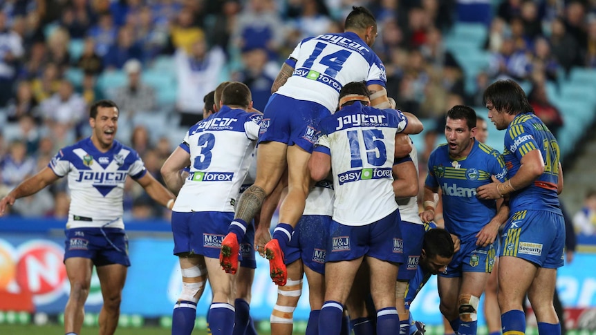 Bulldogs celebrate Tolman try against Eels