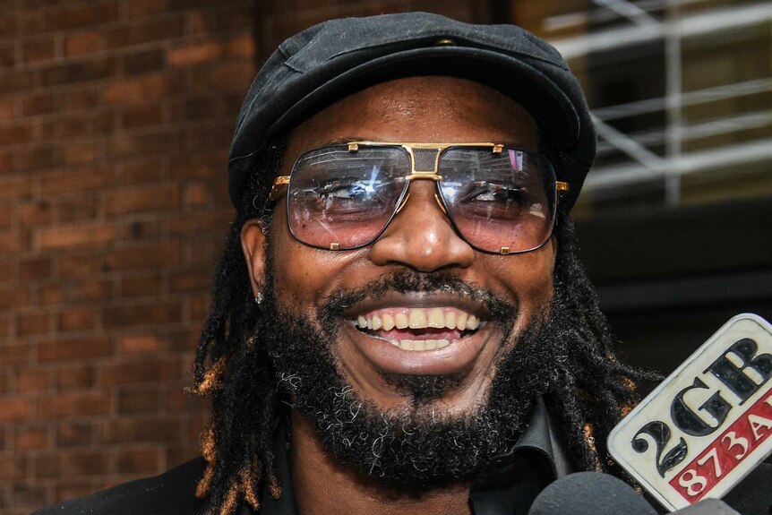 Chris Gayle outside court
