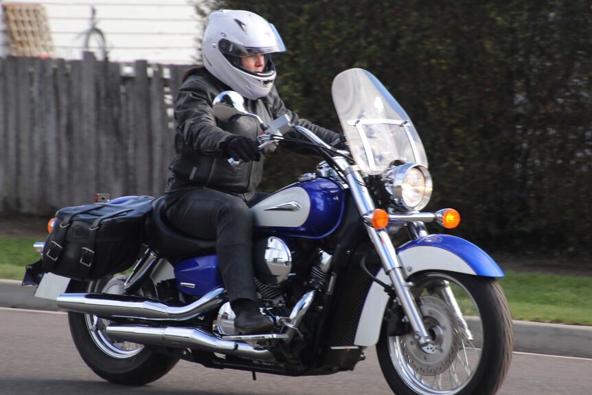 Female motorcycle rider.