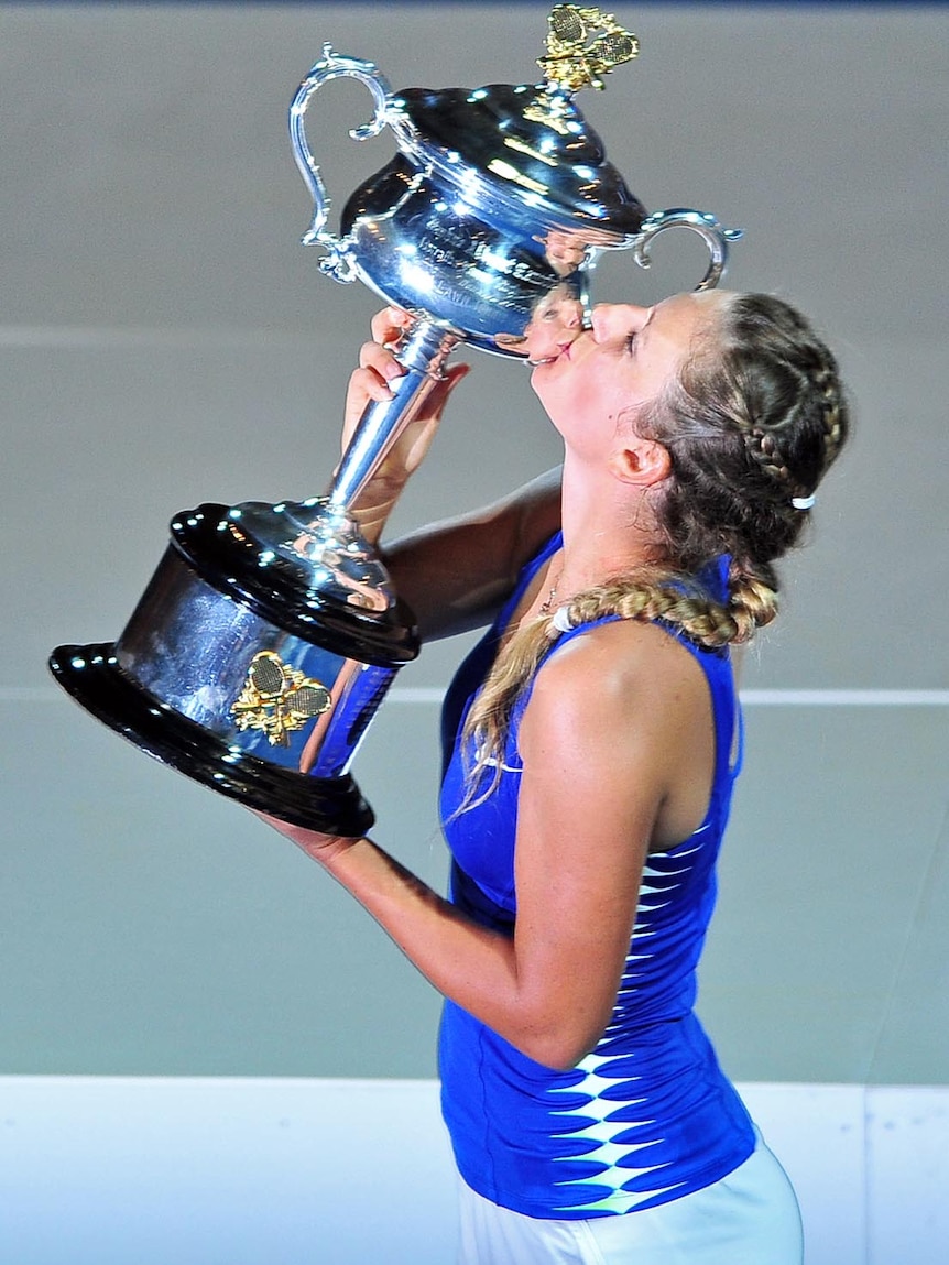 Victoria Azarenka kisses her trophy after winning the 2012 Australian Open women's final.