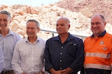 WA Premier Roger Cook and Education Minister Tony Buti pose with Peter Hicks from the Murujuga Aboriginal Corporation
