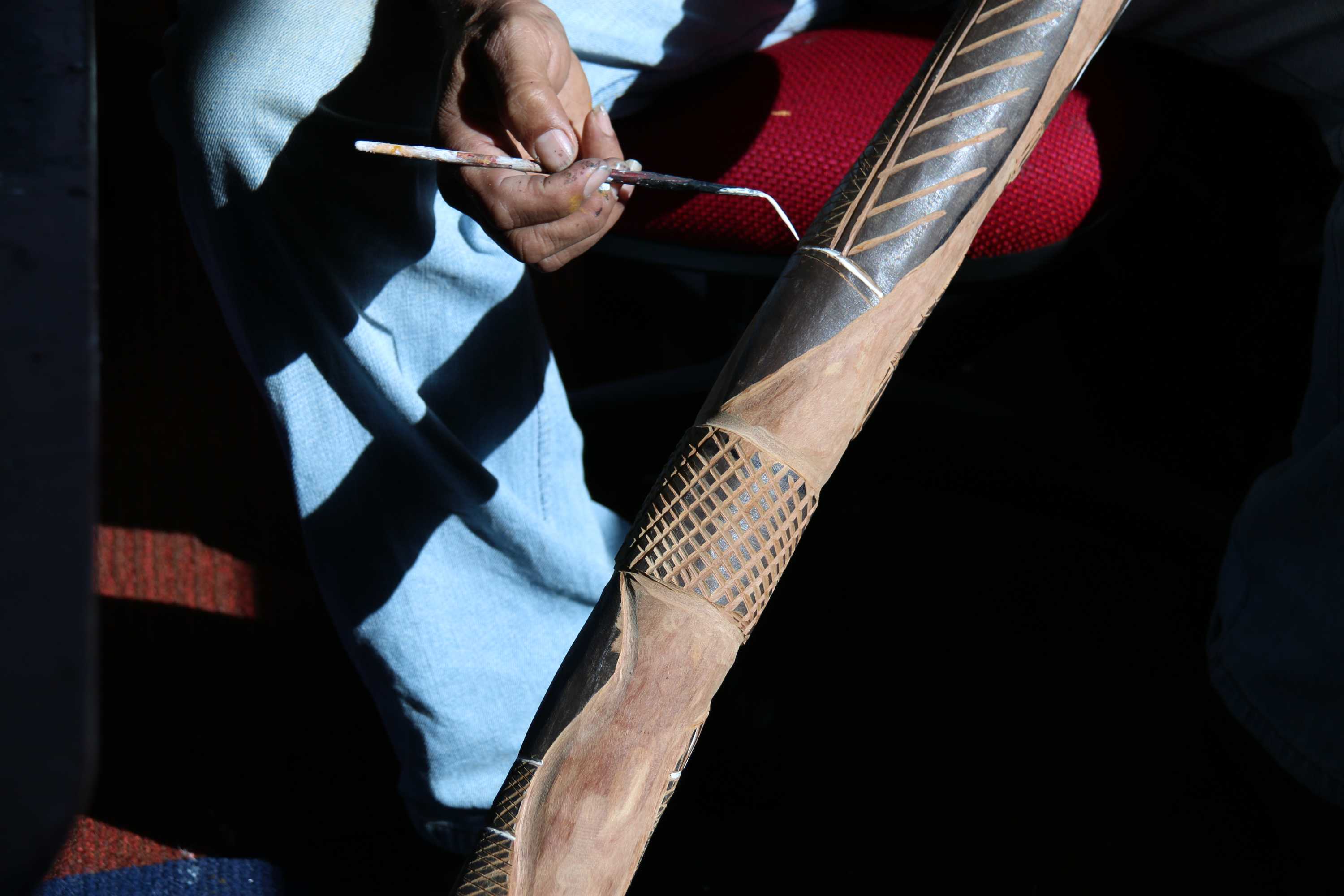 Canberra men rediscover cultural links through art of didgeridoo making