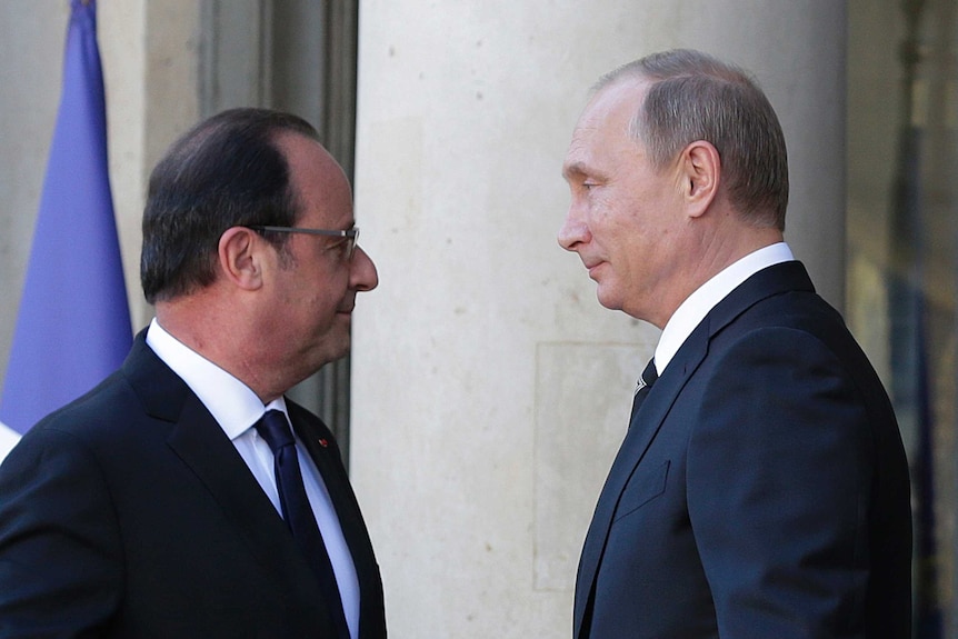 Vladimir Putin and Francois Hollande meet