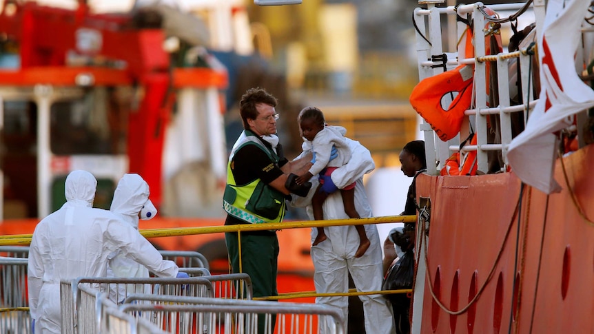 Rescue ship carrying 230 migrants docks in Malta, ending week-long stand-off