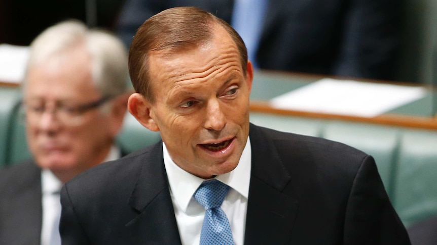 Prime Minister Tony Abbott delivers a statement to the House of Representatives at Parliament House in Canberra.