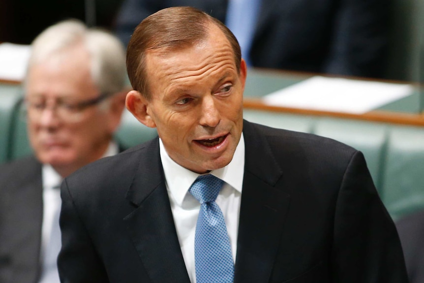 Prime Minister Tony Abbott delivers a statement to the House of Representatives at Parliament House in Canberra.