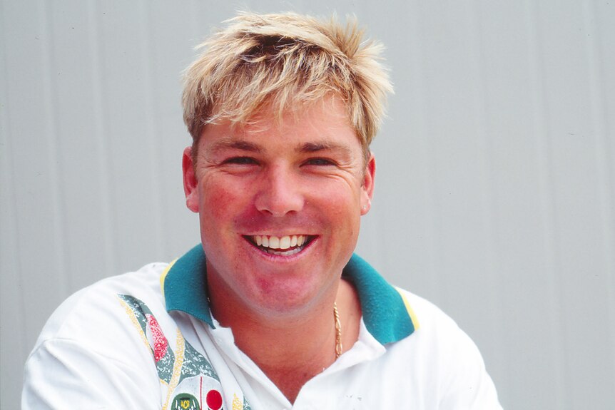 A young Shane Warne smiles