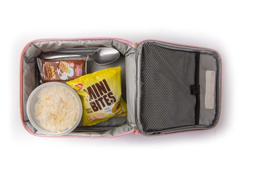 A small tub of steamed rice, cheese rice cake bites and an Italian cacao biscuit in a pink cooler bag.