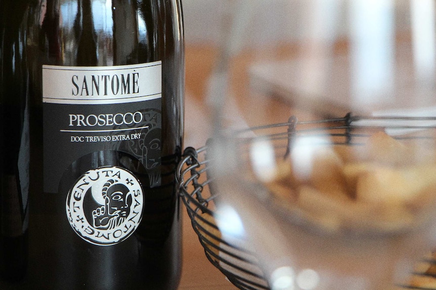 Close-up of Santome Prosecco DOC Treviso Extra Dry bottle
