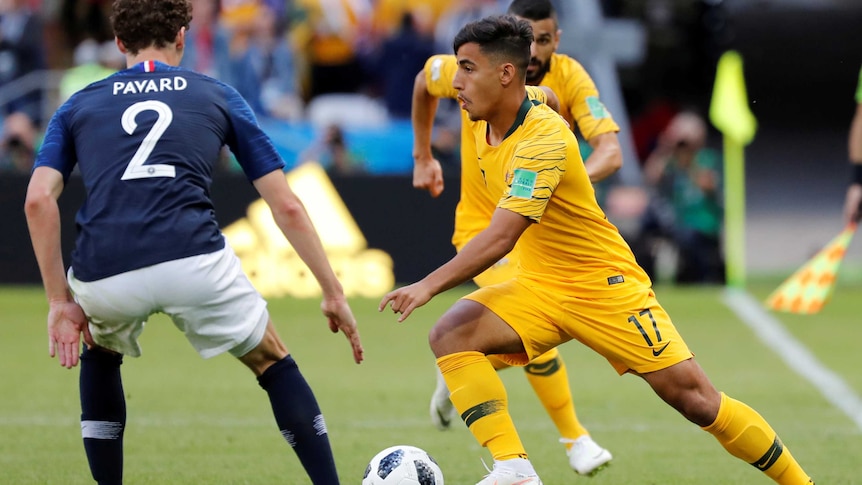 Australia's Daniel Arzani in action with France's Benjamin Pavard at Kazan Arena, Kazan, Russia on June 16, 2018.