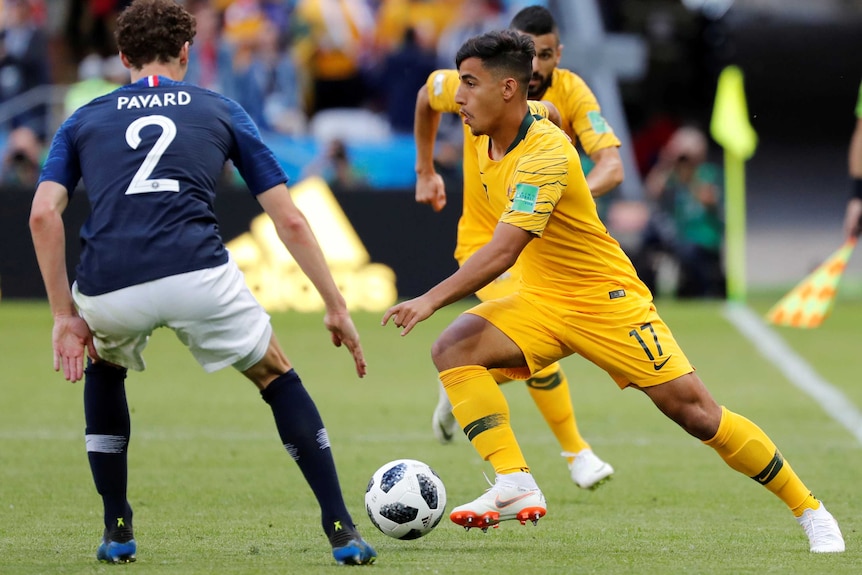 Australia's Daniel Arzani in action with France's Benjamin Pavard at Kazan Arena, Kazan, Russia on June 16, 2018.