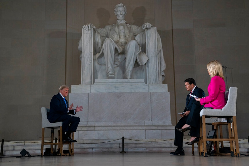 President Donald Trump speaks to Bret Baier and Martha MacCallum during a Fox News virtual town hall