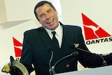 Qantas has axed the in-flight safety video starring John Travolta.