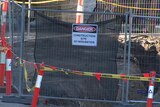 A sign on a construction site saying do not enter.