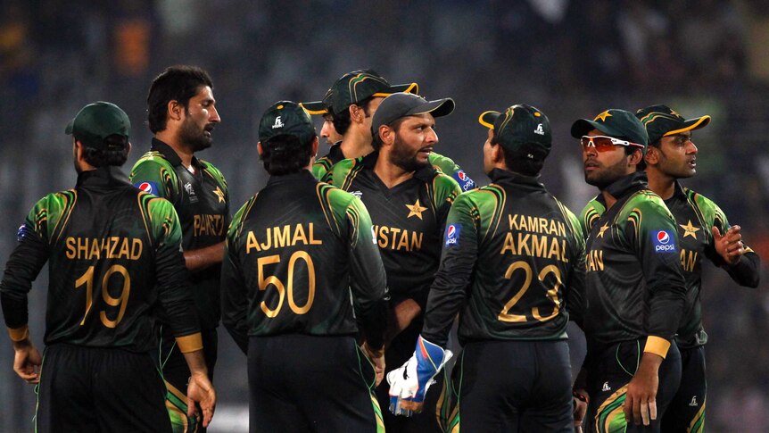 Pakistan fielders celebrate a wicket during the ICC World Twenty20 match in Dhaka on April 1, 2014.