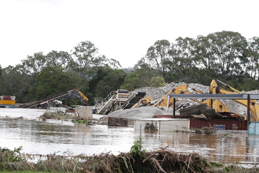 A business damaged by flooded water near Nyholt Drive, Yatala.