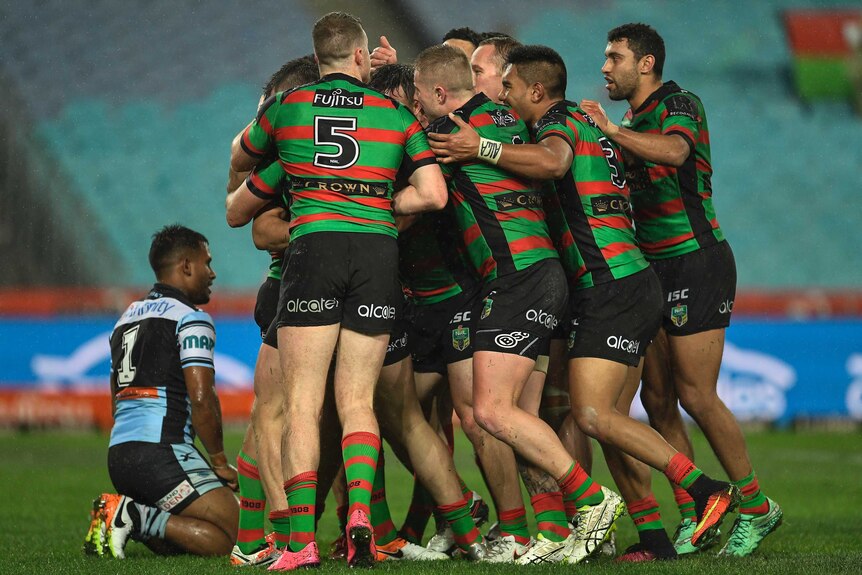 Rabbitohs celebrate a try against Cronulla