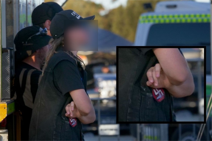 A young man wearing a swastika attends the Goldfields Burnouts event.