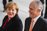 German Chancellor Angela Merkel smiles at Prime Minister Malcolm Turnbull.
