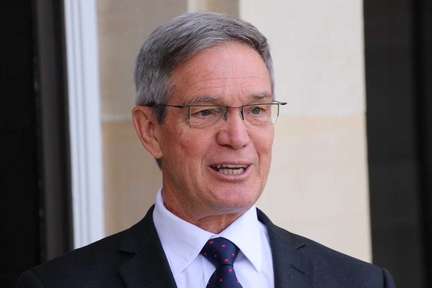 Mike Nahan at a media conference at Parliament.