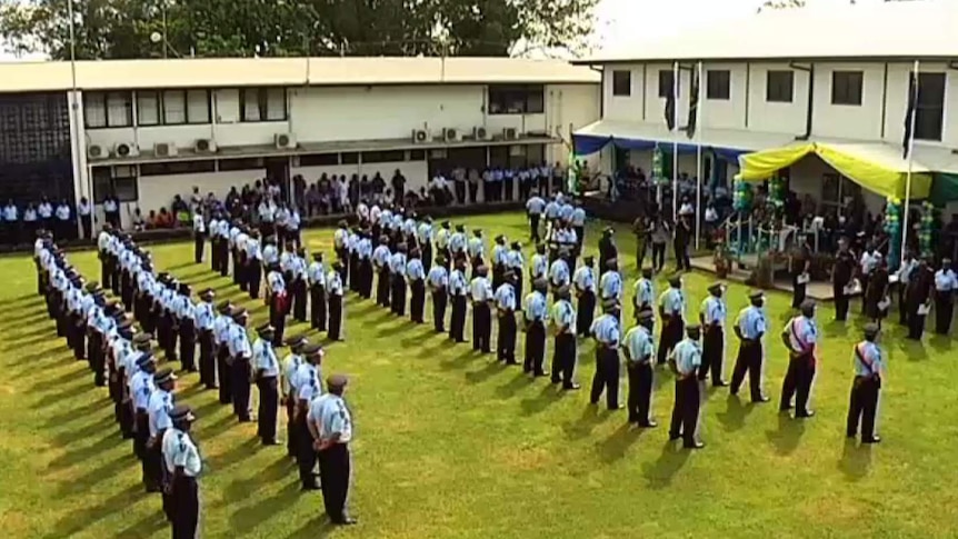 Solomon Islands police officers attend a special ceremony at the police headquarter in Honiara, on the day of the rearmament.