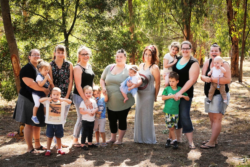 Past Kurnai Young Parent Program students with their children.