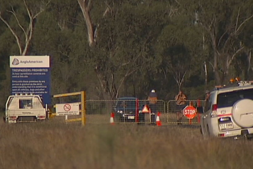 Workers at entrance to Anglo American's Grasstree coal mine near Middlemount, north-west of Rockhampton in May 2014.