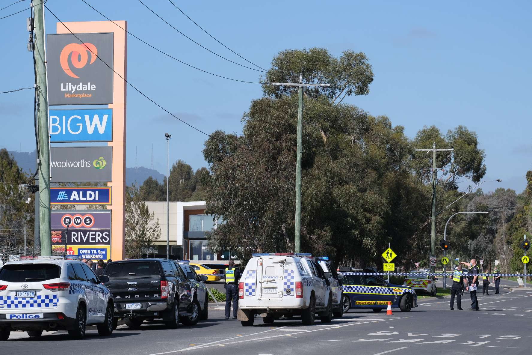 Police say officers shot man at Melbourne shopping centre after he ...
