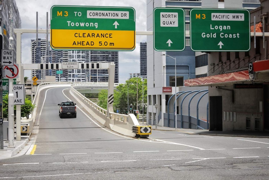Car drives up exit ramp in Ann Street out of in Brisbane city towards Toowong on January 11, 2021.