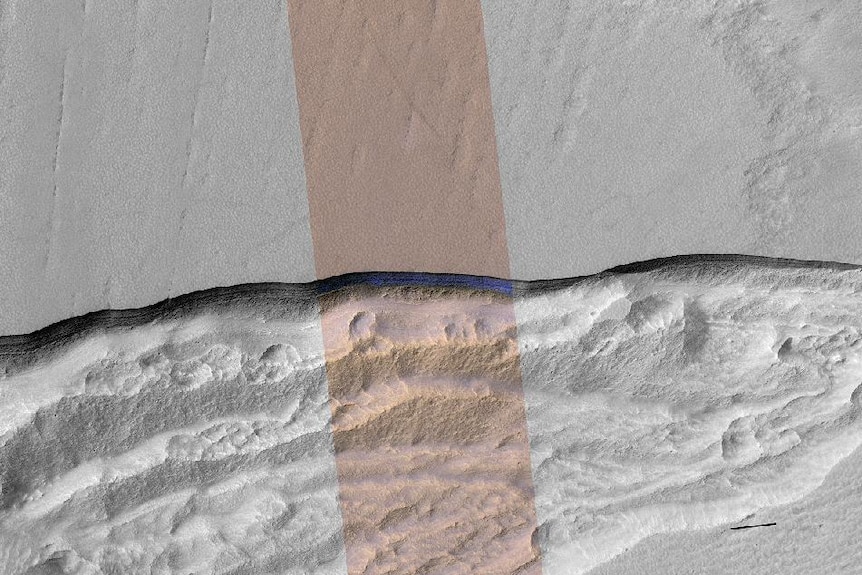 An aerial view highlighting a small cross-section of an ice deposit found on Mars.