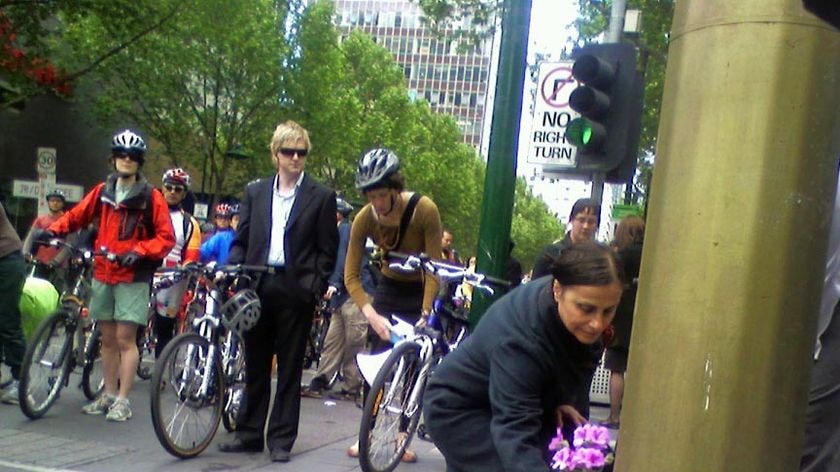 Cyclists laid flowers at the spot where Carolyn Rawlins died.