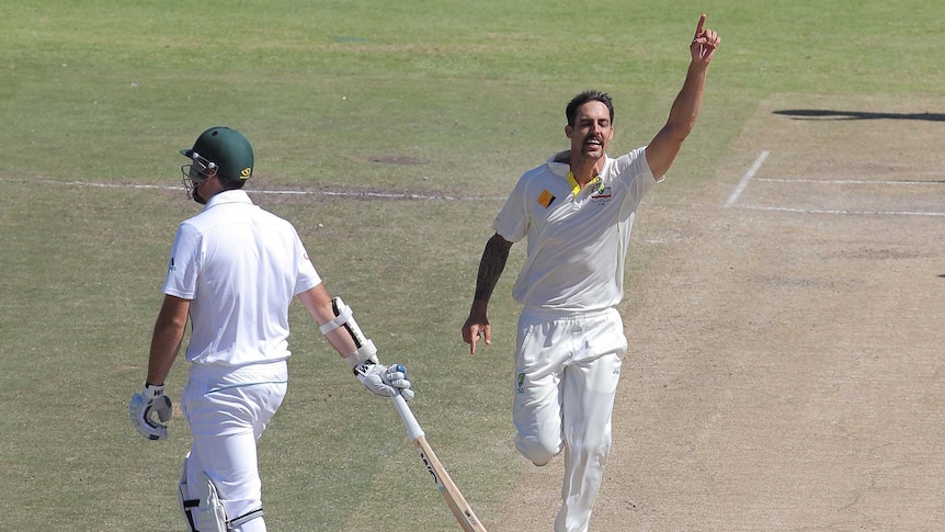 Australia's Mitchell Johnson celebrates the wicket of South Africa's Graeme Smith on day four.