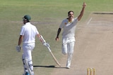 Australia's Mitchell Johnson celebrates the wicket of South Africa's Graeme Smith on day four.
